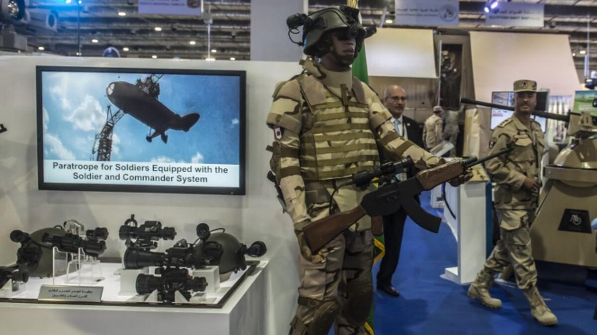 Visitors attend Egypt’s first Service Defence Exhibition in Cairo on December 3, 2018, at the International Exhibition Center. 
Khaled DESOUKI / AFP