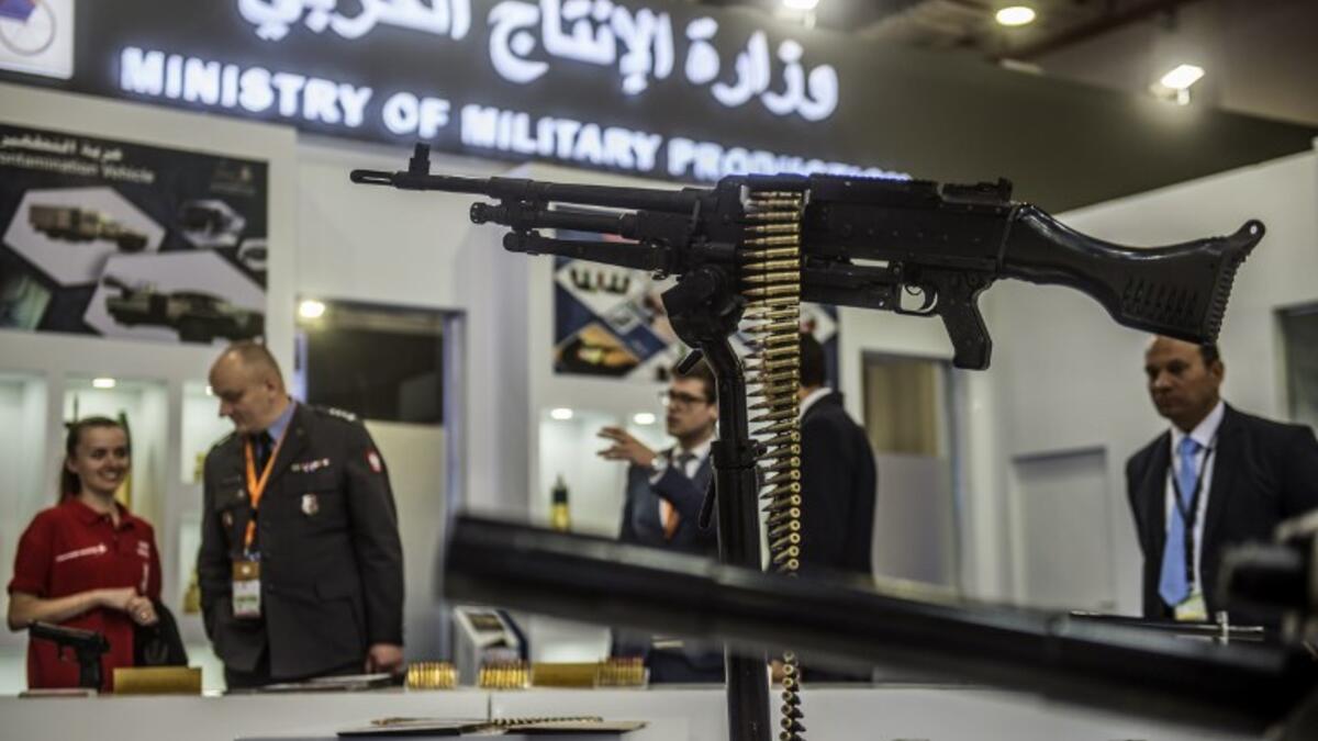 Visitors attend Egypt’s first Service Defence Exhibition in Cairo on December 3, 2018, at the International Exhibition Center. 
Khaled DESOUKI / AFP
