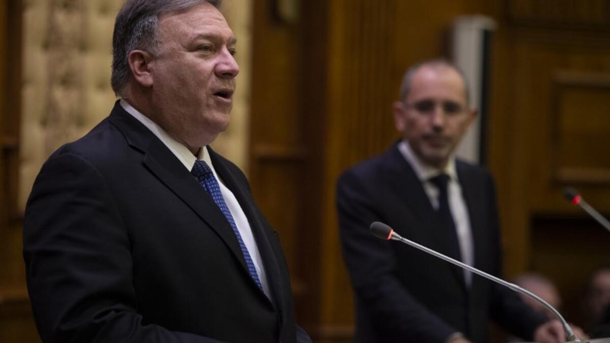 US Secretary of State Mike Pompeo (L) holds a press conference with Jordanian Foreign Minister Ayman Safadi in Amman at the start of a Middle East tour to show commitment to the region after the US President's surprise decision to withdraw troops from war-torn Syria on January 8, 2019. 
ANDREW CABALLERO-REYNOLDS / POOL / AFP