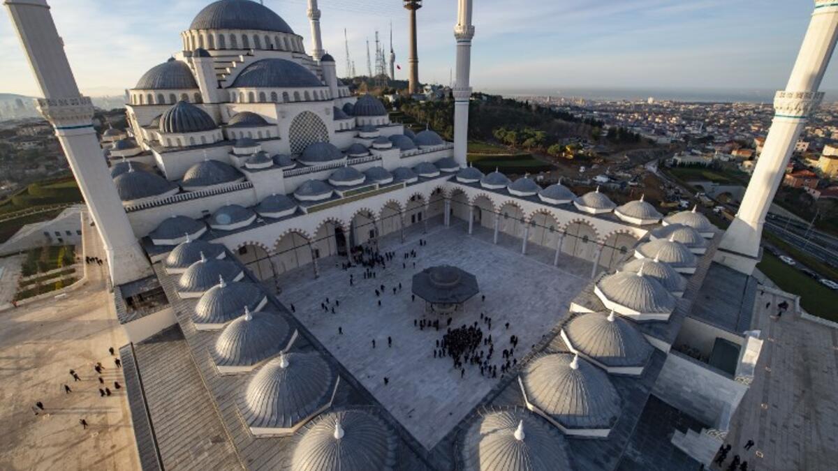 People arrive for the early morning prayers at the Camlica Mosque in Istanbul, which opened March 7, 2019. Hundreds of people arrived to attend the first ever prayer at the largest mosque in Asia Minor.
YASIN AKGUL / AFP