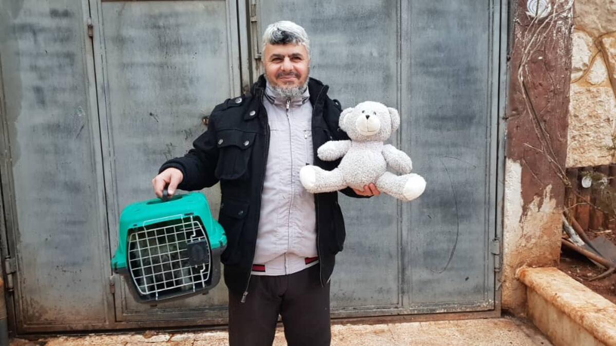 Our vet Dr Yoossef rescued this wonderful cat today 
And like every child , he asked for a teddy bear as a reward. (Twitter/@theAleppoCatman)