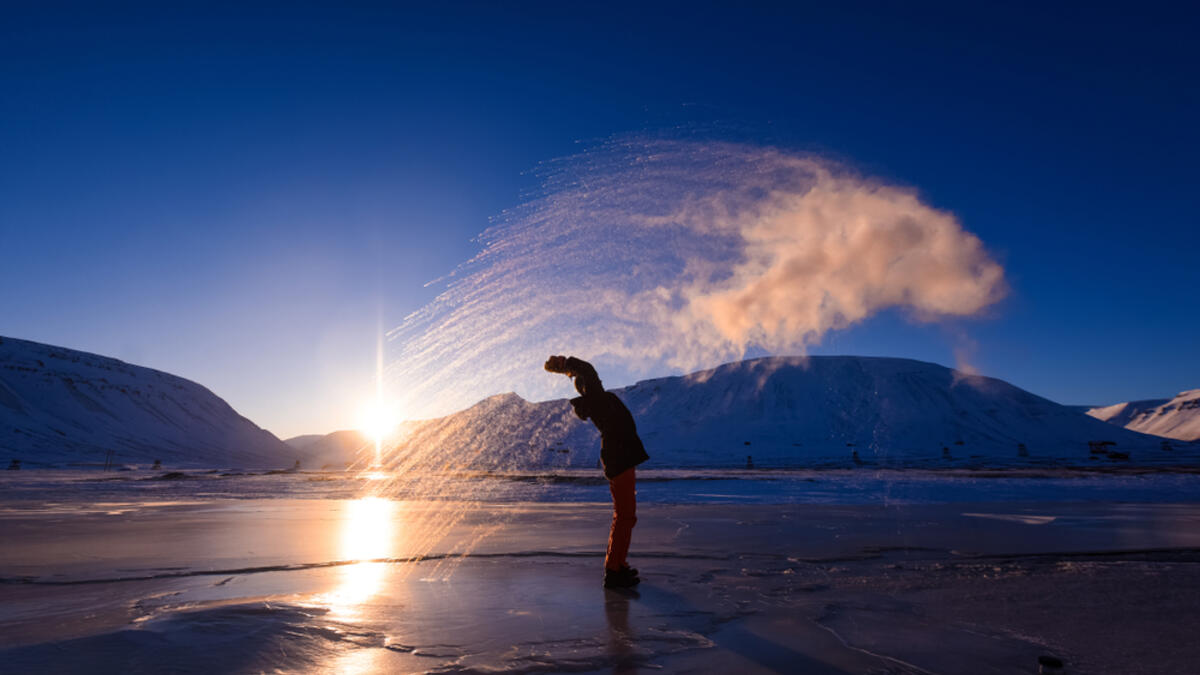 Frost effect hot water freezes man pours boiling water. (Shutterstock/ File Photo)