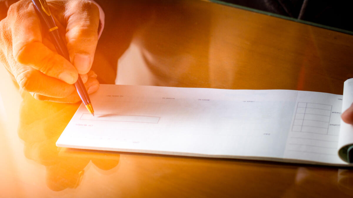 Cheque comes from the Arabic saqq, a written vow to pay for goods when they were delivered. (Shutterstock/ File Photo)