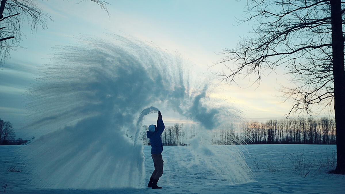 Frost effect hot water freezes man pours boiling water. (Shutterstock/ File Photo)