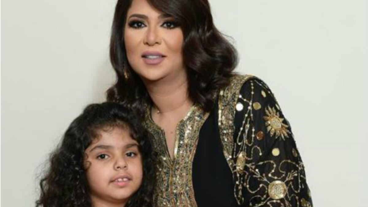 Nawal Al Kuwaitiyeh chose a Abaya from HAMSA By Sharifa Al Ghanim for her TV appearance in the show