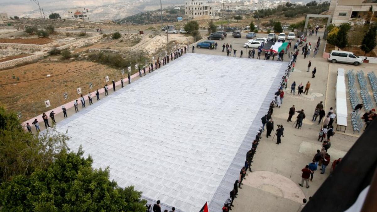 Arial photo of largest Keffiyeh with a size of one thousand four hundred Meter square in dura, near the West Bank town of Hebron, on November 14. (HAZEM BADER / AFP)