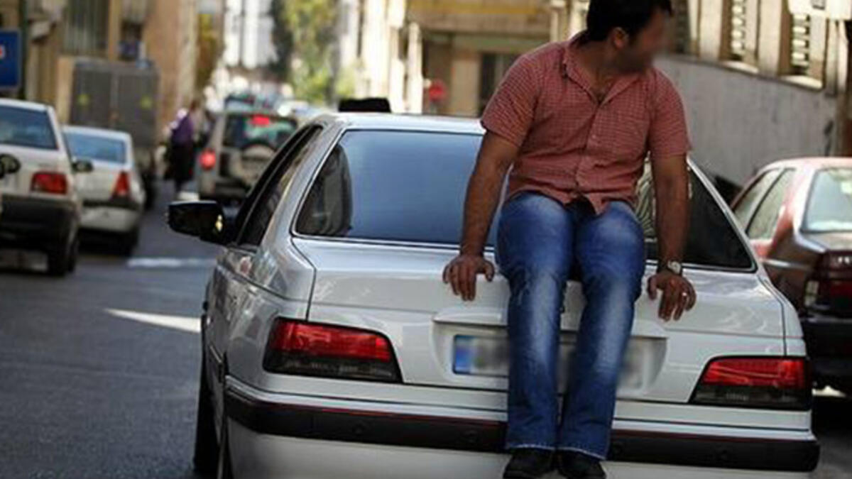 In Tehran, local authorities restrict the number of cars allowed on the road according to their license plates (even numbers are allowed one day, odd the next). Drivers have found a quirky solution: hire people to sit and walk behind their cars to cover the plate. Why not just tape over the numbers like they do in China?