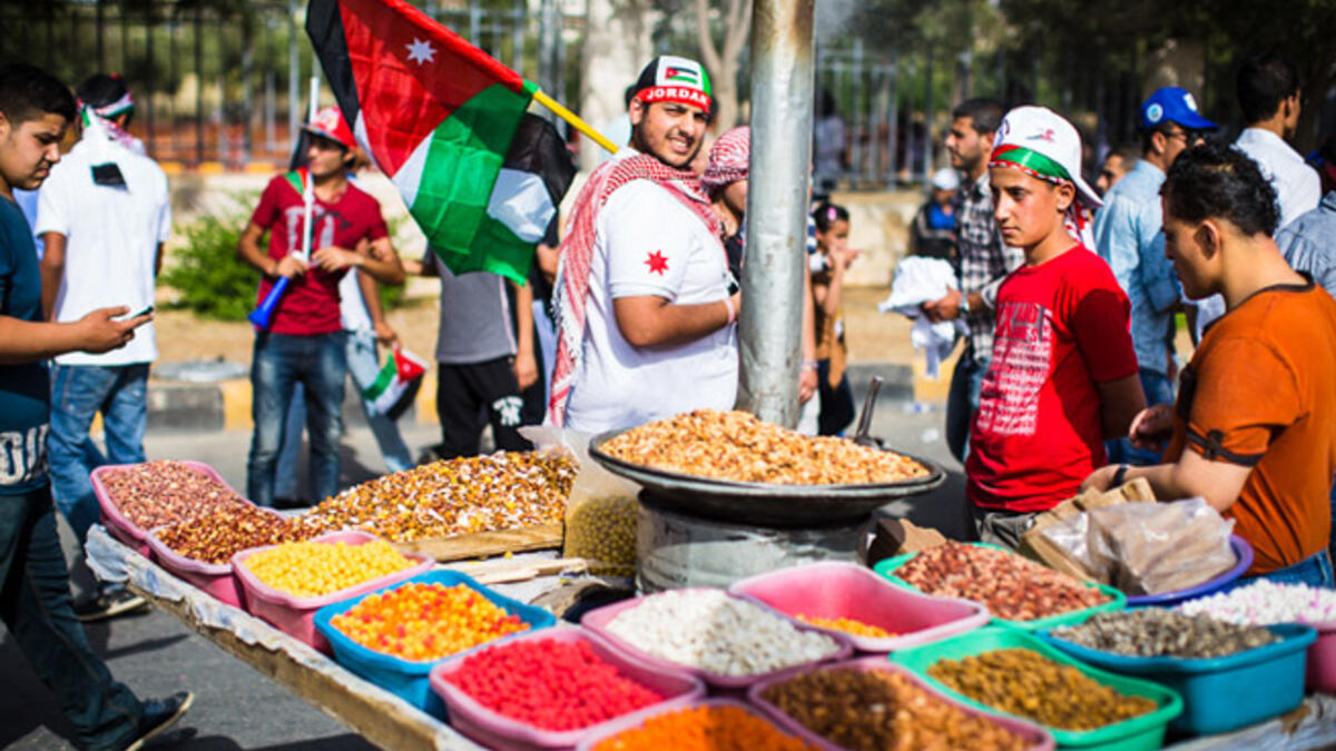Just outside the gates to King Hussein Park, large crowds gathered in the afternoon to watch the Royal Jordanian Air Force fly overhead in an airshow, while the occasional parade marched by.