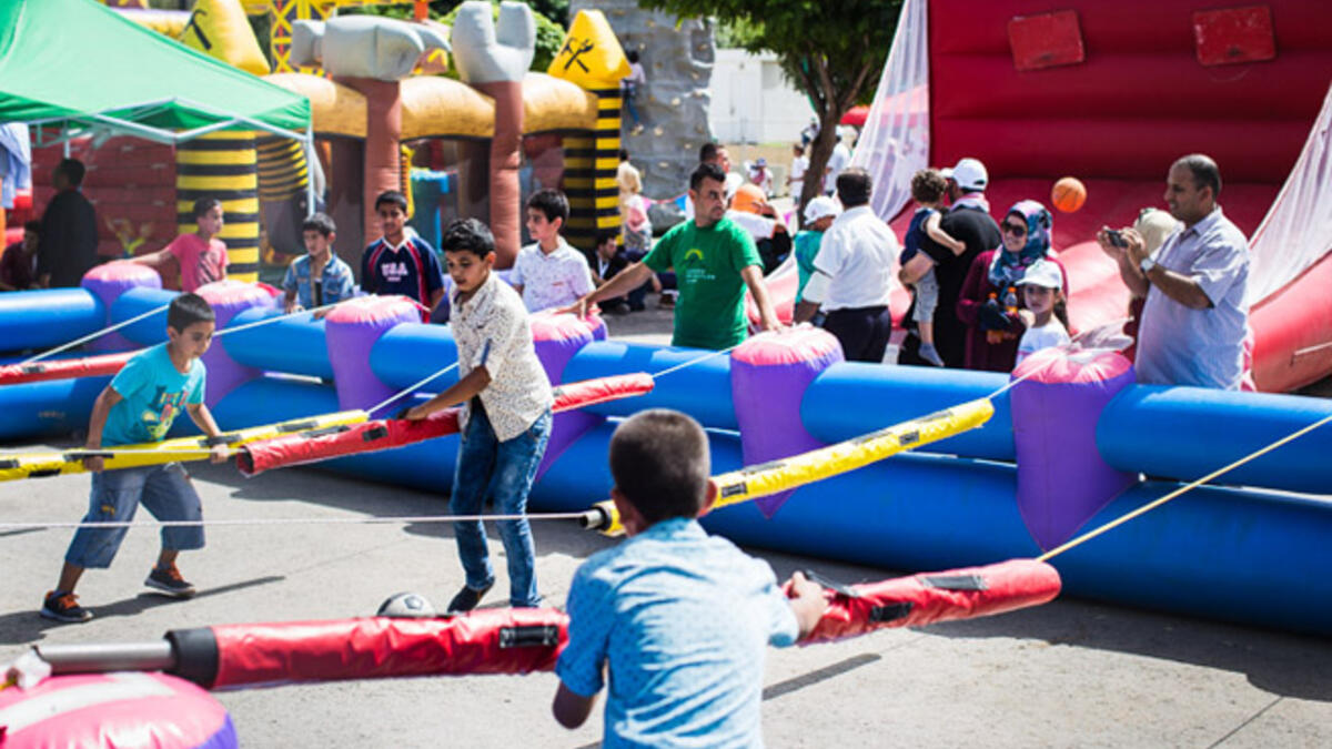 Sadly, only kids were allowed to play in the huge play area complete with bouncy castles, human foosball, and bubble soccer.