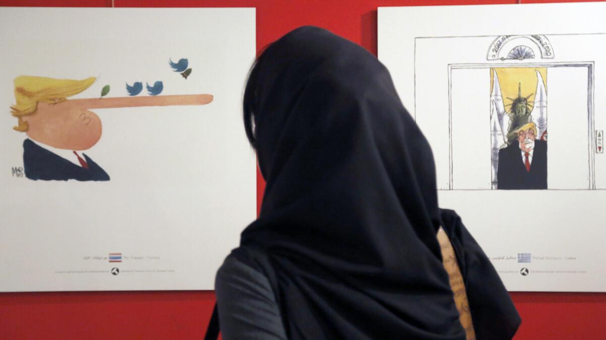 Entries from Thailand- on the left, and Greece- on the right. (AFP)