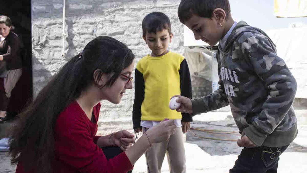Yezidi kids hit their eggs against each other until one wins by breaking the other’s egg. The game is played before the eggs are eaten and the shells are kept for the following day.