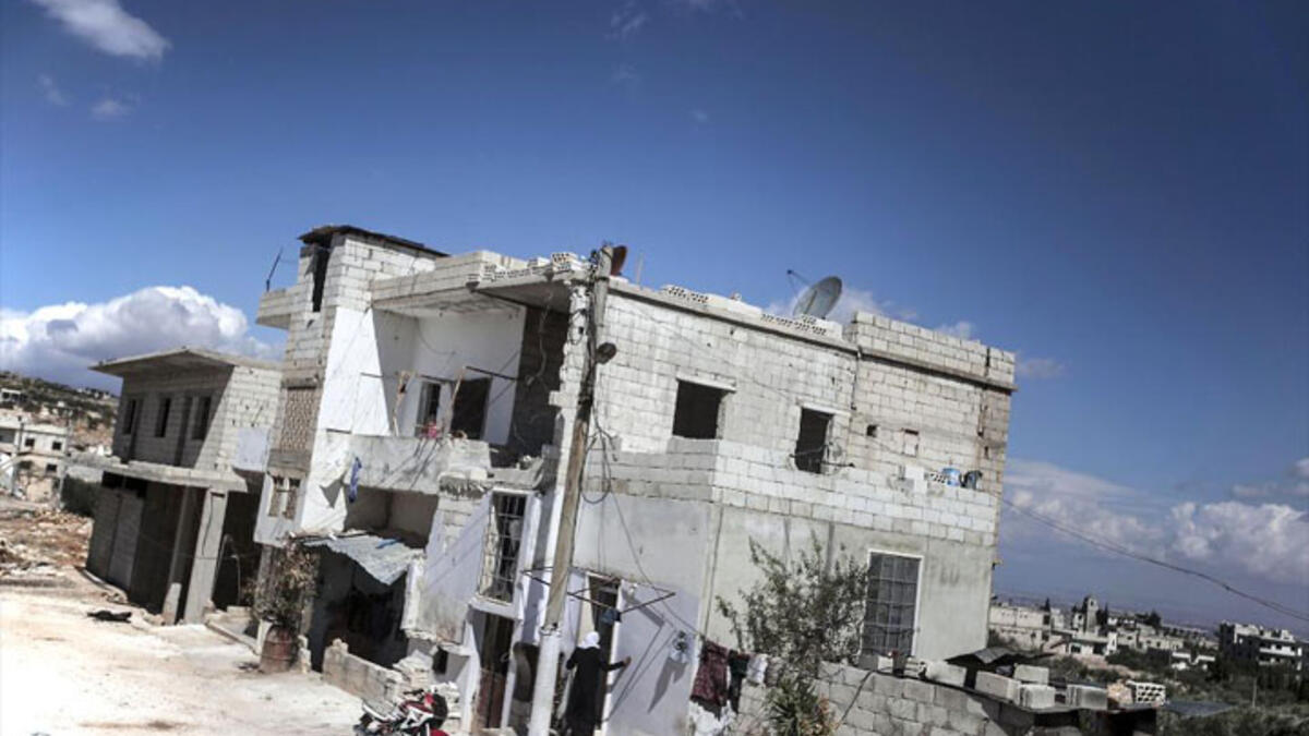 Located in the once-restive Idlib district, residents of Syria's northwestern town of Kfar Lata were pouring out by the thousands a year into the Syrian conflict in 2012. Once home to 10,000 Syrians, a TIME photographer spent the day with what appeared to be the very last family inhabiting the dilapidated village in 2013.