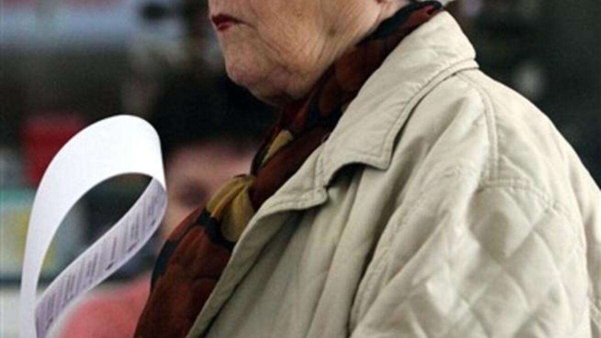 A woman waits to cast her ballot at a polling station in Chisinau. Moldova voted in a parliamentary election that aims to end a prolonged power vacuum in Europe&amp;#039;s poorest country as it seeks to establish EU membership and sustainable growth.