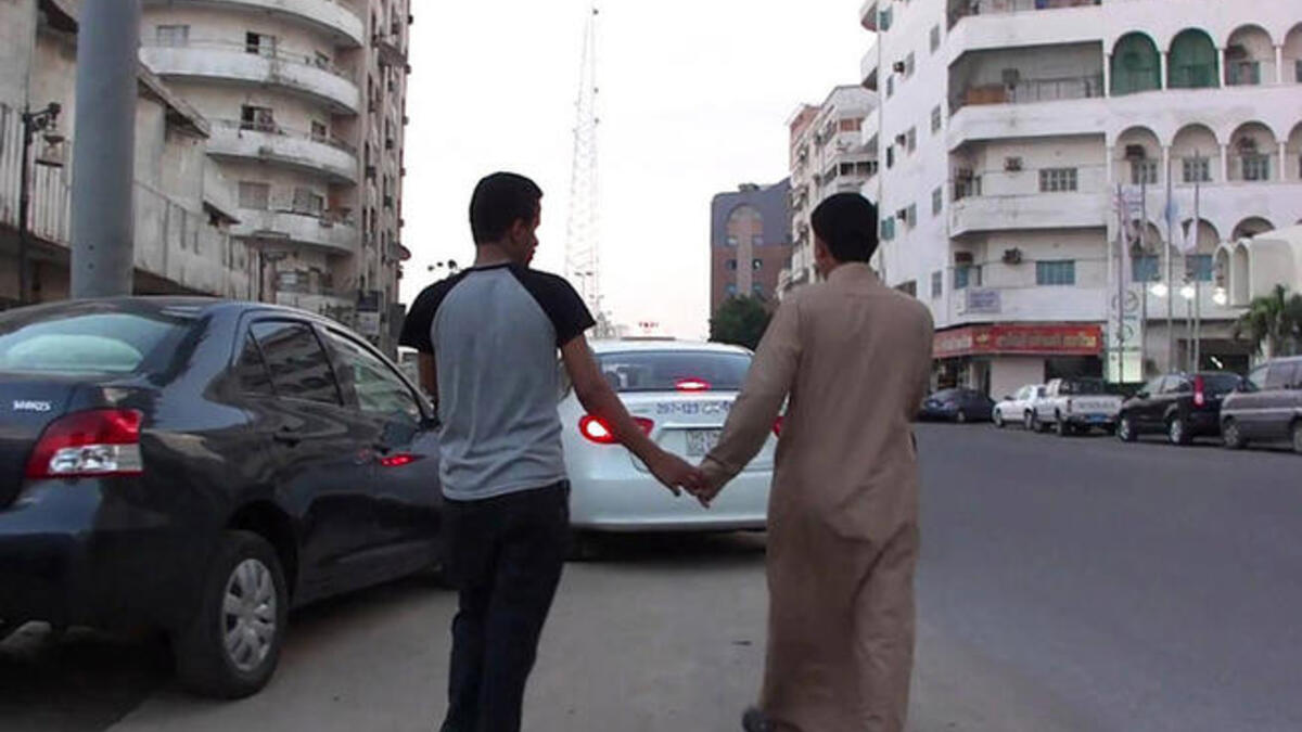 arabs holding hands