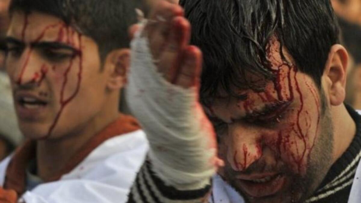 Ashura's rituals: Shia men & women dressed in black parade the streets slapping their chests & 
chanting. Things can get ugly, even violent, with all the raised testosterone around (even if mostly directed at oneself).
Still, today, blood-spilling or self-injury is frowned upon and has been toned down, or kept to the minimum symbolic gestures.