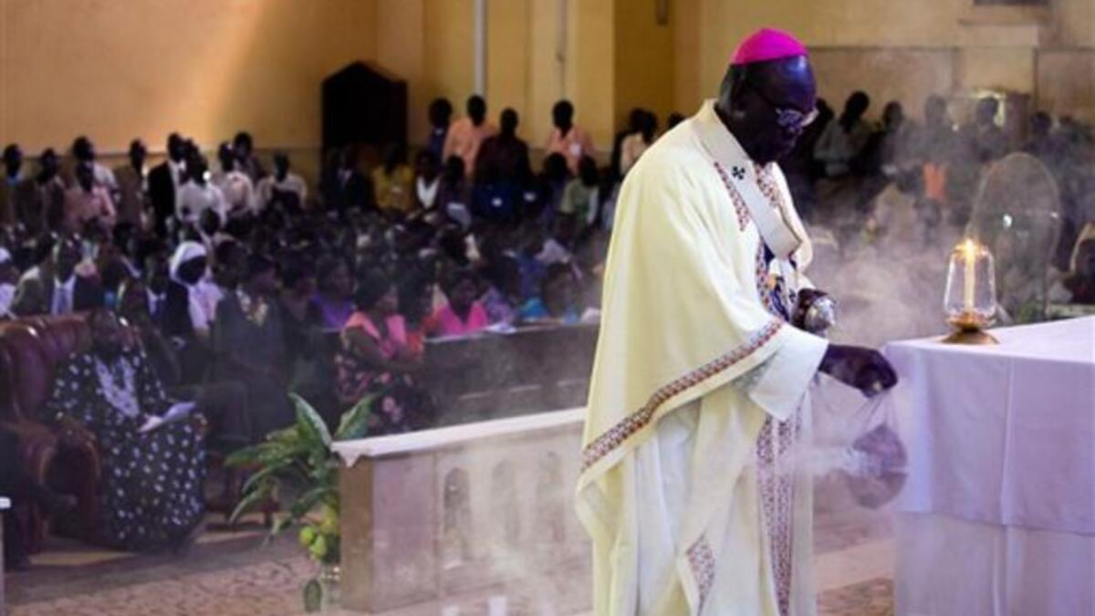 Sudan's First Vice President and south Sudan leader Salva Kiir (seated L) attends the Christmas service at the Juba Catholic Cathedral, in the southern Sudan's capital city, in what may be their last Christmas in a unified Sudan.