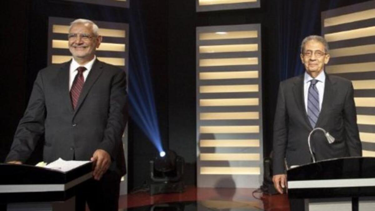 Egyptian TV debates: Amr Moussa (R) faces off Aboul Fotouh (L)