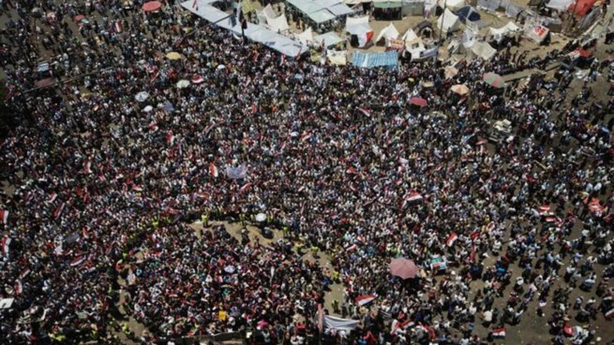 Egyptians return to Tahrir square, calling for the downfall of another Egyptian President (AFP)