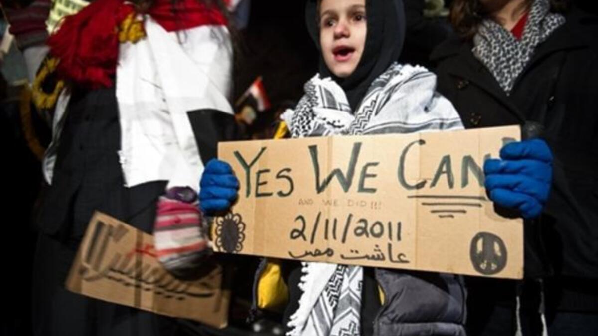 Egyptians in Washington DC, US, apply the once resonant "Can-do" campaign to celebrate people power outside the Egyptian embassy from their US seat of government vantage.