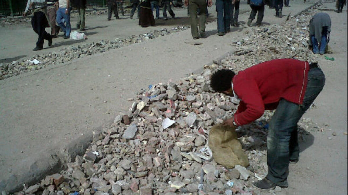 Egyptian protesters ensure a Clean Revolution as they responsibly make efforts to keep the public space clear and in order.
