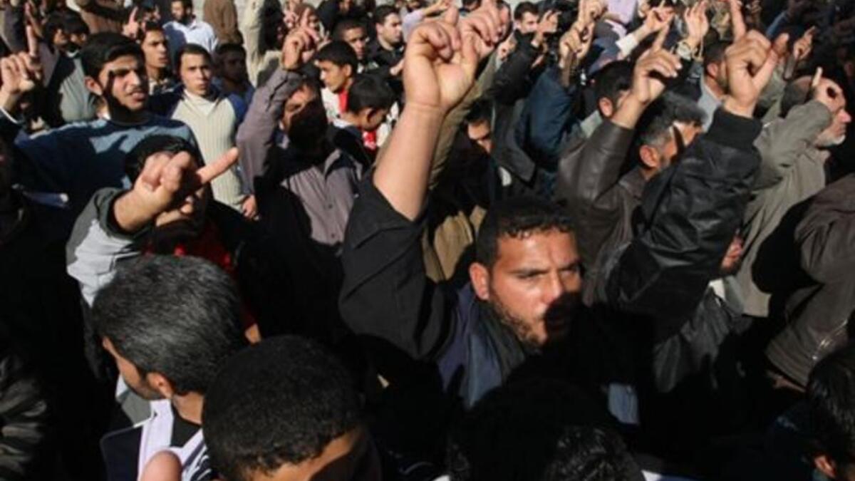 Islamic Jihad supporters protest as they mark the second anniversary of Israel's three-week offensive on the Gaza Strip.