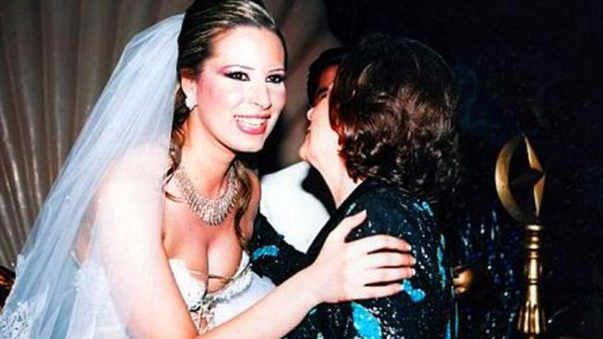 9Father of the Bride: Every Dad's proud dream is to see their daughter - particularly an only daughter- married. Here, 
wedded in all the Gaddafi glory bestowed upon her. She also gave birth to a granddaughter to Daddy Gaddafi just last month 
while on the run...She named her after mother, Safia.