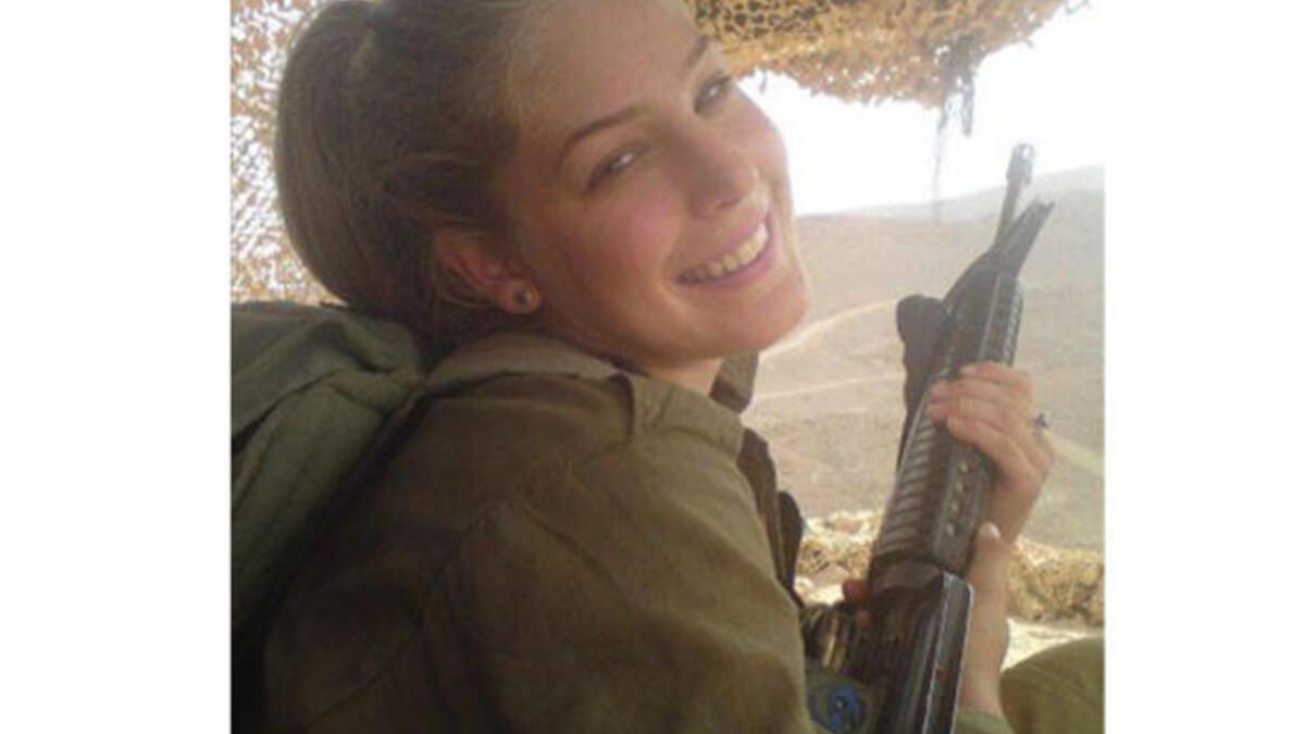 Camouflage really brings out the color of her eyes.