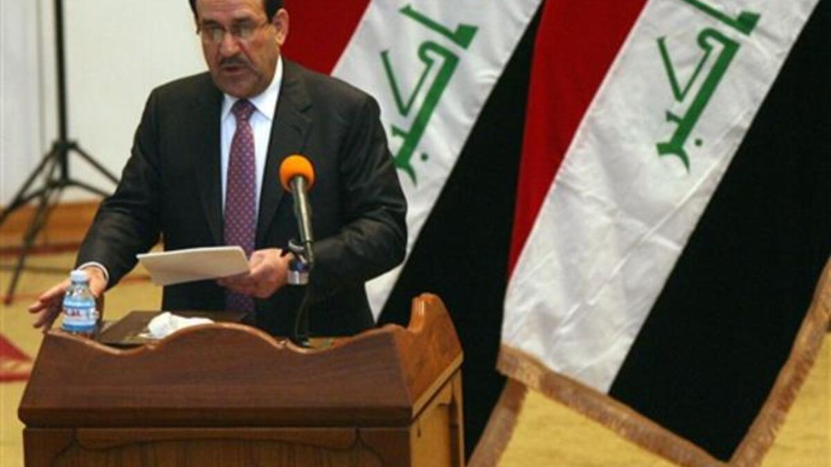 Iraqi Prime Minister Nuri al-Maliki addresses the parliament during a session in which lawmakers unanimously approved the new government which will be headed by the incumbent Shiite premier.