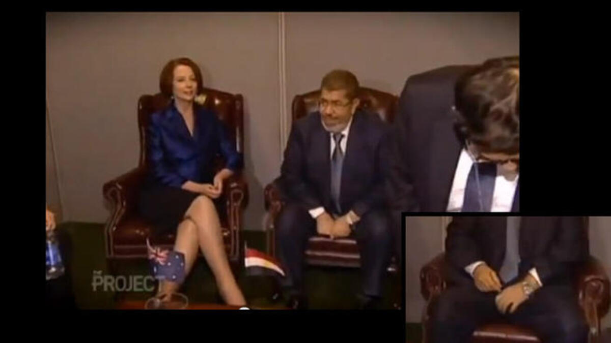 Morsi scratches his balls in a meeting with Australia's PM