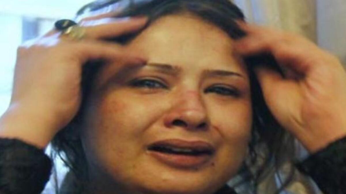 Looking distressed and clearly in agony. Gaddafi forces suggested possibility she was inebriated or intoxicated, probably on the Nescafe and pill cocktail alleged to fuel the protesting masses.