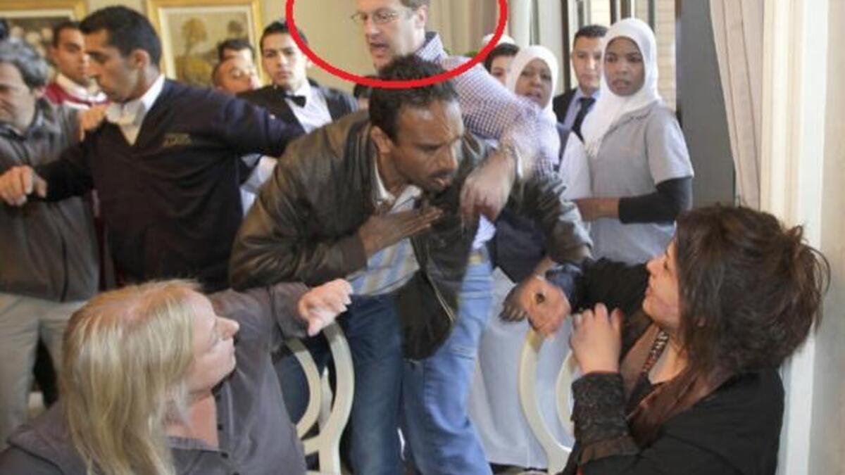 Charles Clover of the Financial Times — a pretty big and young guy, physically, with the build a college rugby player — was attempting to put himself between her and the security forces trying to drag her away. A casualty of the scuffle, his iPhone was thrown to the ground.