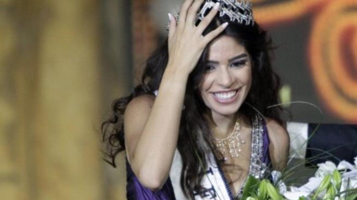 Yara Khoury Mikael is crowned after winning the Miss Lebanon 2011 beauty contest in the commercial center of downtown Beirut.