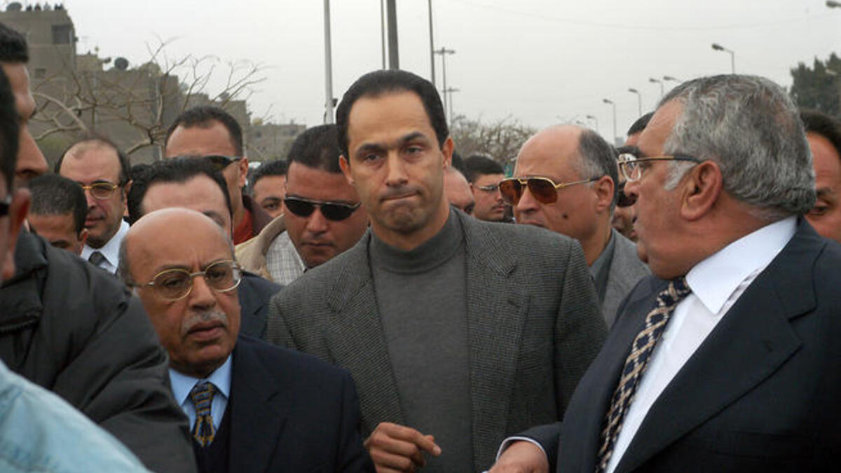 Gamal Mubarak- Arrested wearing white, while claiming innocence, and showing shock and disbelief. Probably disbelief cause they didn’t think it would come to this. Unshaven, Jamal was more disheveled than elder brother Alaa.