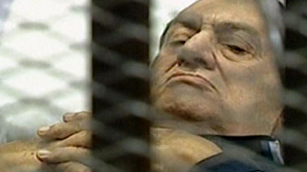 Mubarak on trial on a stretcher trolley