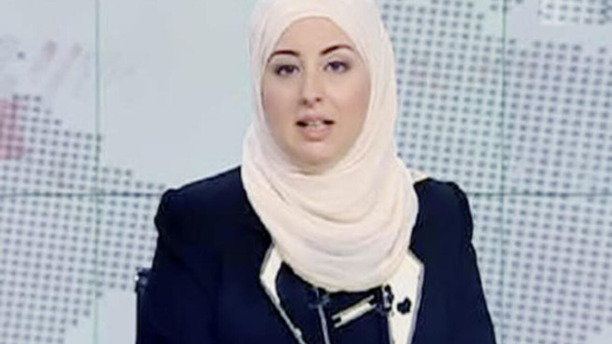 Egypt's first veiled news anchor