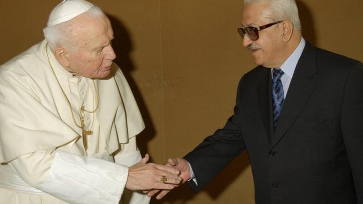 Pope John Paul II receives Iraq's Deputy PM Tarek Aziz at the Vatican