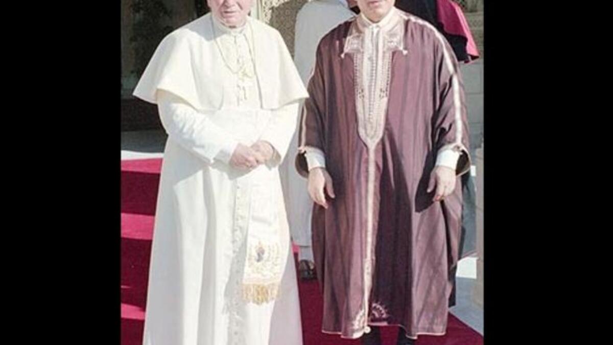 Pope John Paul II poses with Ben Ali in Tunisia