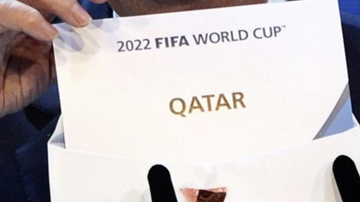 FIFA president Joseph Blatter opens the envelope to reveal that Qatar will host the 2022 World Cup at the FIFAheadquarters in Zurich.