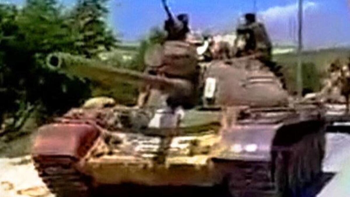 Regime tanks pound Latakia & Homs operating a shoot-to-kill policy: Syrian Khaled al-Hamed is shot & run over 
by a tank. Rolling out his murderous agenda for 'dealing' with his uprising- or flattening it- Al-Assad reminds us of Israeli nearly-indicted war Criminal Ariel Sharon, 'Bulldozer', for his predilection for clearing Palestinians off land.
