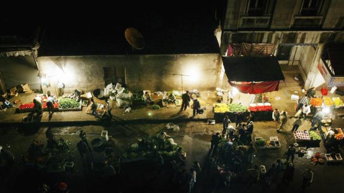 Night owls' late shopping: People are active at night and the markets operate later hours
to suit the consumers' schedules and activity, much like late night Christmas shopping. This hubbub marks the slight reversal of day
to night for the community who become more active after the break of fast.