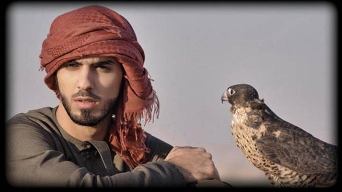 Sorry ladies, looks like Omar’s already got a bird on his arm