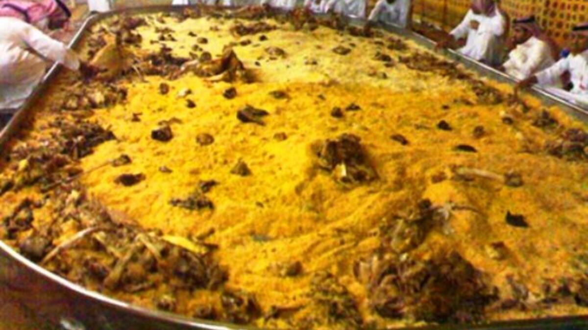 'Kabsa' : A traditional Arabian rice and meat dish. Picture taken from a period when a cooking storm of competitions swept the region for 'biggest humus/ tabbouleh' stand-offs