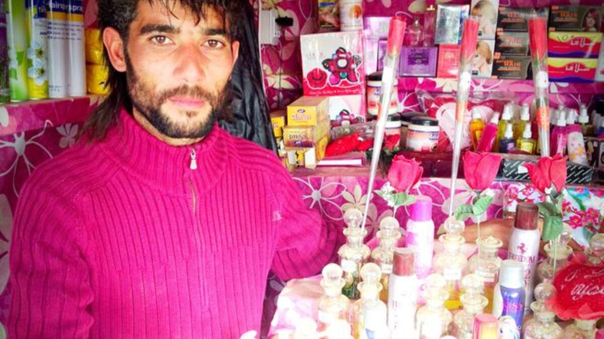 perfume shop refugee camp (UNHCR/ G. Beals)