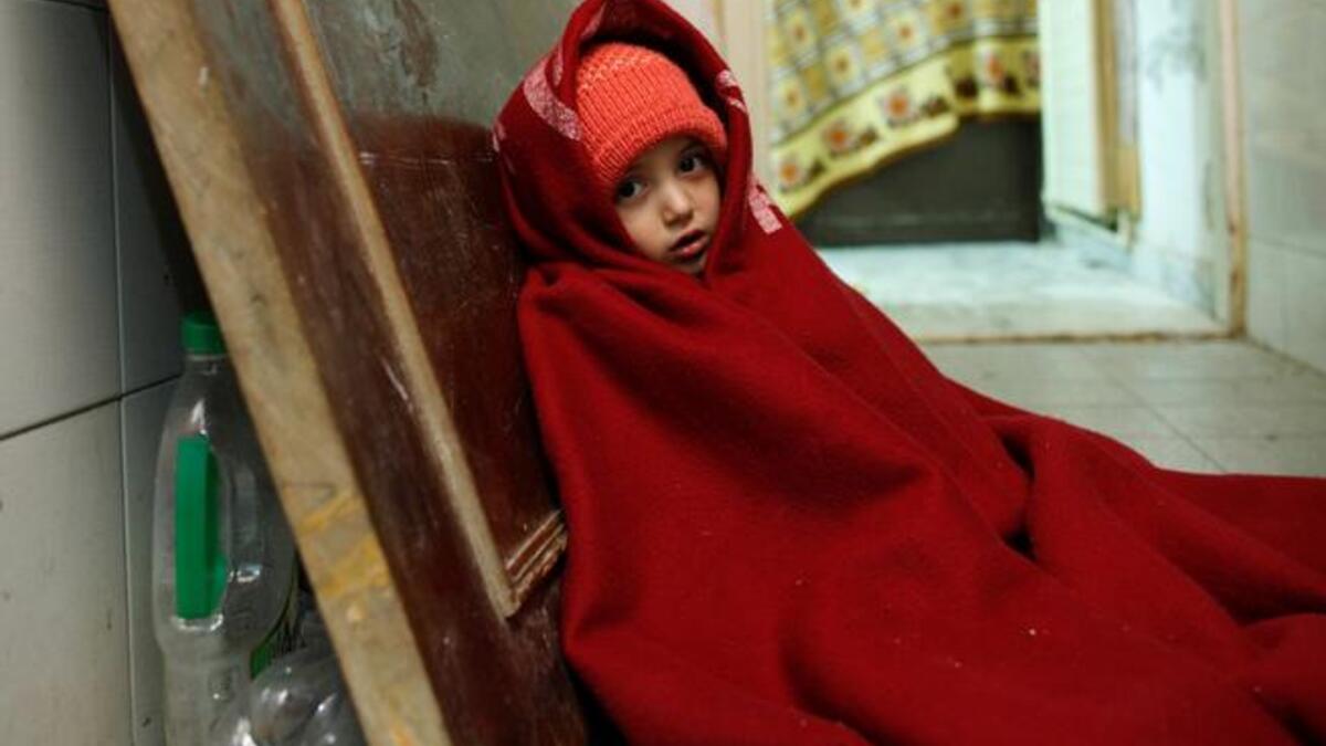 Syrian girl sits in an Amann apartment (Photo UNHCR/ B. Sokol)