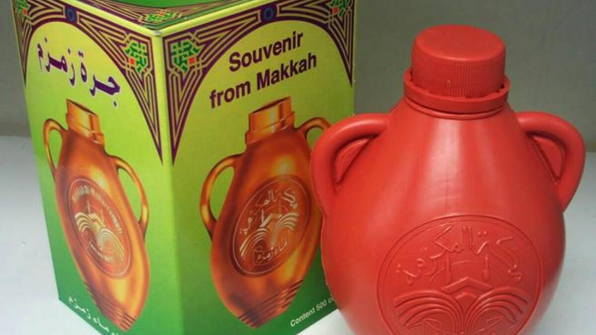 This badge of pilgrimage pride, a 'souvenir' from the journey of a life-time, represents one of the most
faith-inspiring stories adhered to by Muslims.  In spite of Saudi legislation banning its commercial export, the constant world demand ensures that the sale or supply of water alleged to be Zamzam continues outside the Kingdom.