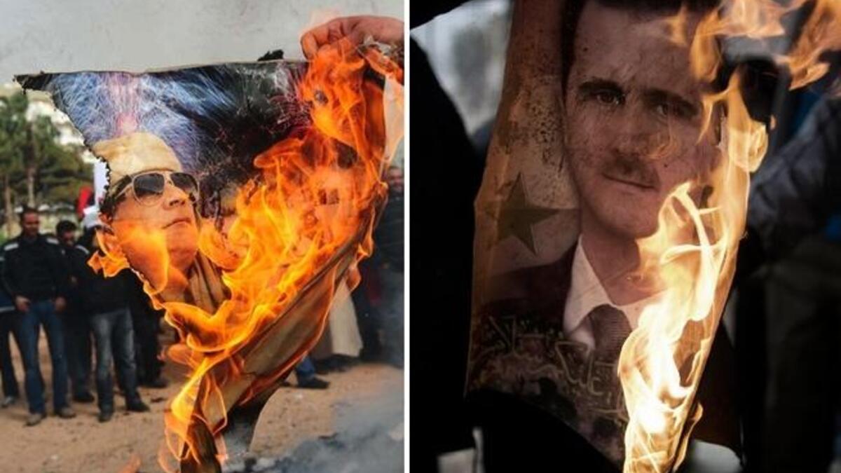 Posters of Gaddafi (left) and Assad (right) being defaced