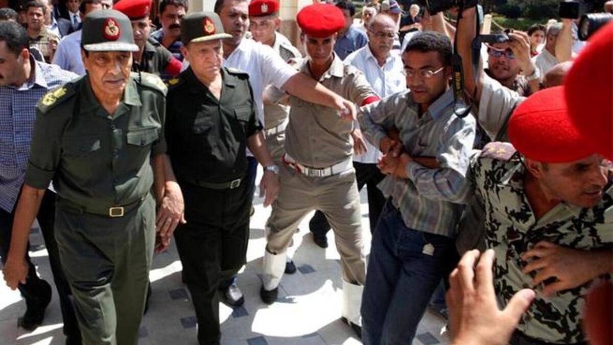 Egypt generals walk as old regime heads roll