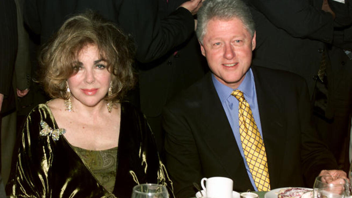 Dame Elizabeth Taylor and President Bill Clinton in 2001 at Beverly Hills. She was also close to other state leaders, such as Israeli Prime Minister Menachem Begin.