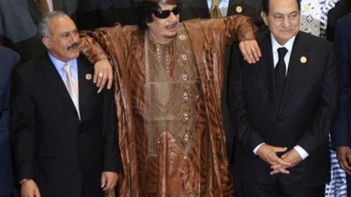 Needing his fellow Arab leaders to prop him up: Qaddafi using Ali Abdullah Saleh and Mubarak as crutches.  But now that they're falling, if not fallen, we doubt they can keep him standing.
