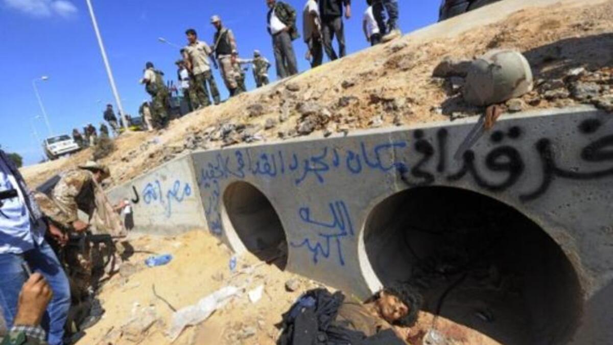 The last guards were male, with not a woman in sight: Found in a man-hole, Colonel Gaddafi and some of his remainingentourage were then subjected to man-handling by the enemy new regime National Council troops. No sign of the feisty women who surrounded the failed leader in life, but not death.
